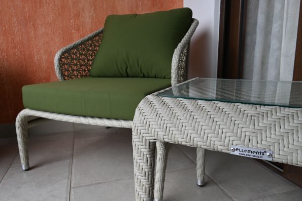 Space-saving furniture ideas for small balconies with a wicker chair and compact table from Ellements.