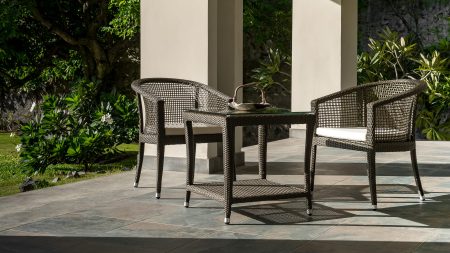 Balcony Outdoor Furniture set with two woven chairs and a glass-top table for stylish patio seating.
